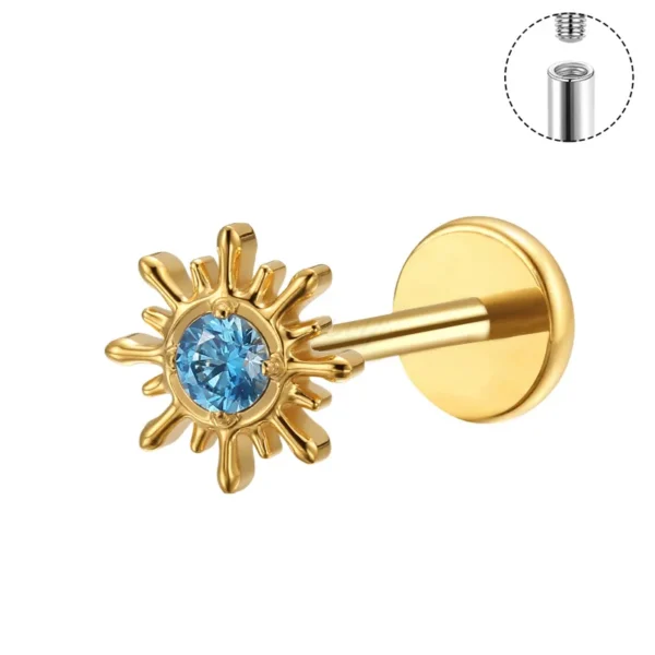 ASTM F136 titanium labret stud with sunburst design and blue crystal